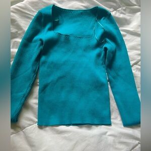 a beautiful blue color long sleeve top